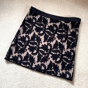 Black lace mini skirt